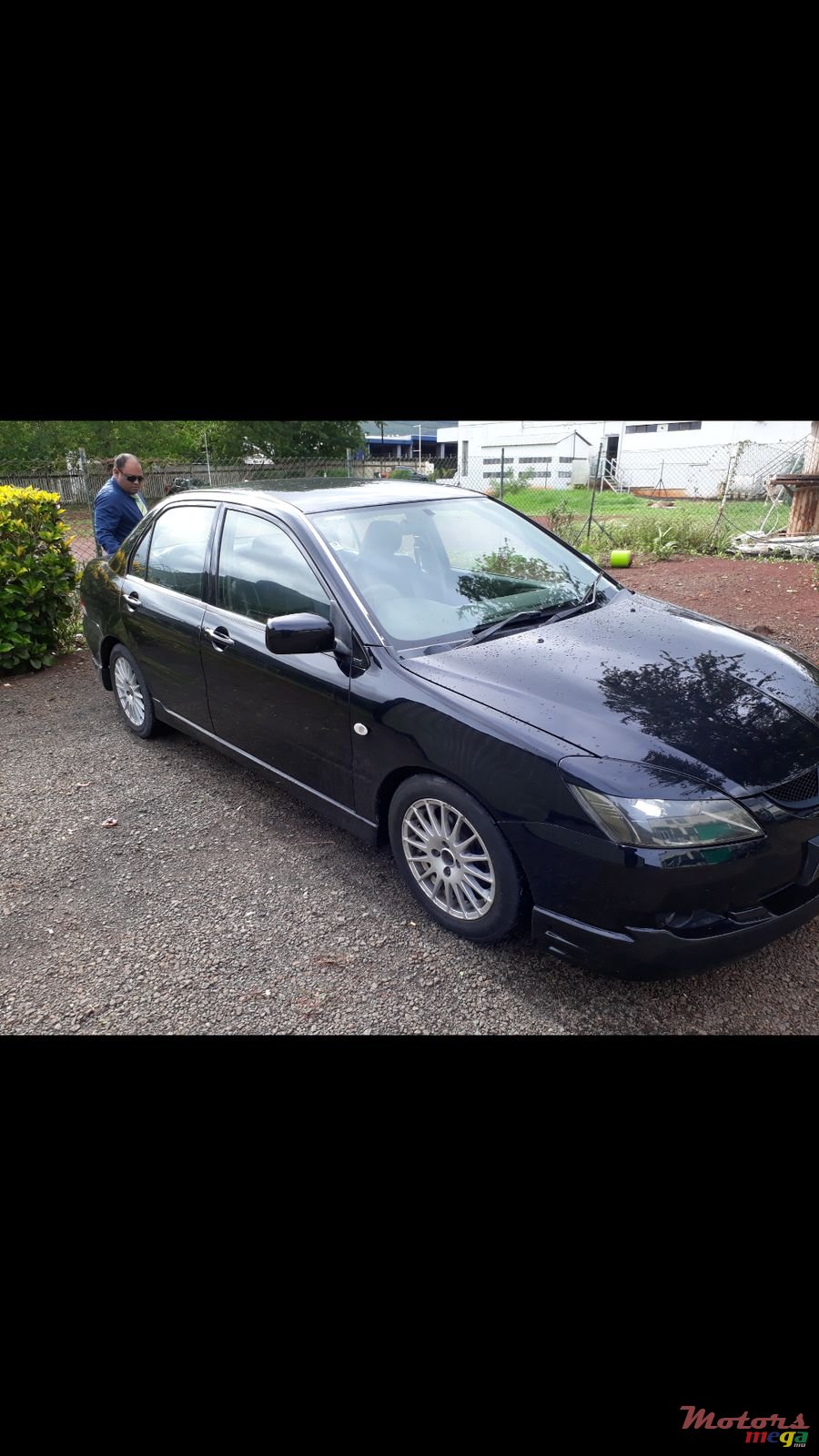 2004' Mitsubishi Lancer photo #1