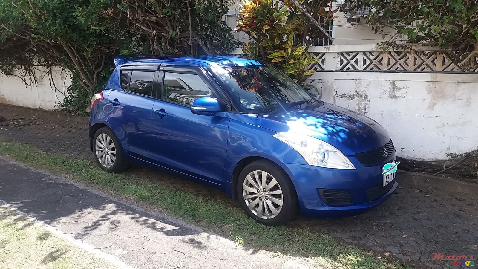 2011' Suzuki Swift photo #1