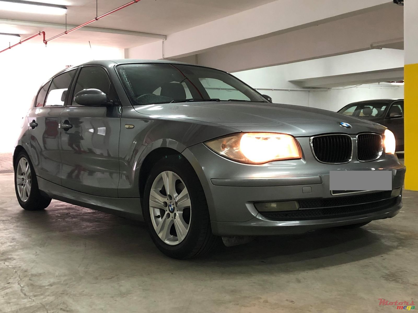 2009' BMW 116 i photo #1