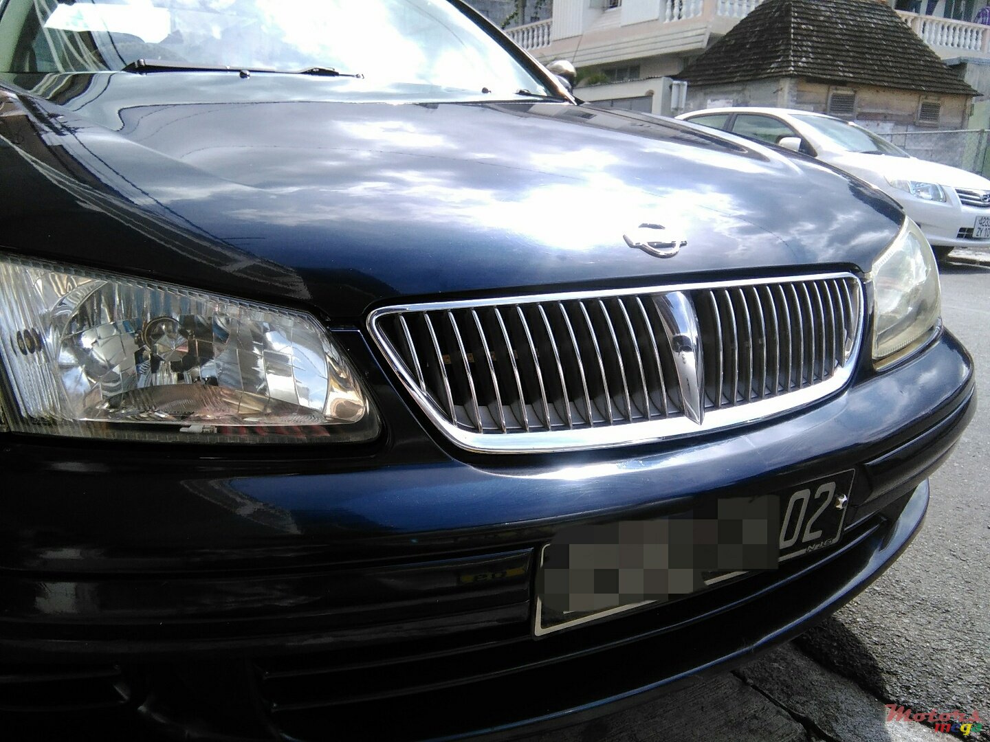 2002' Nissan Sunny original photo #2