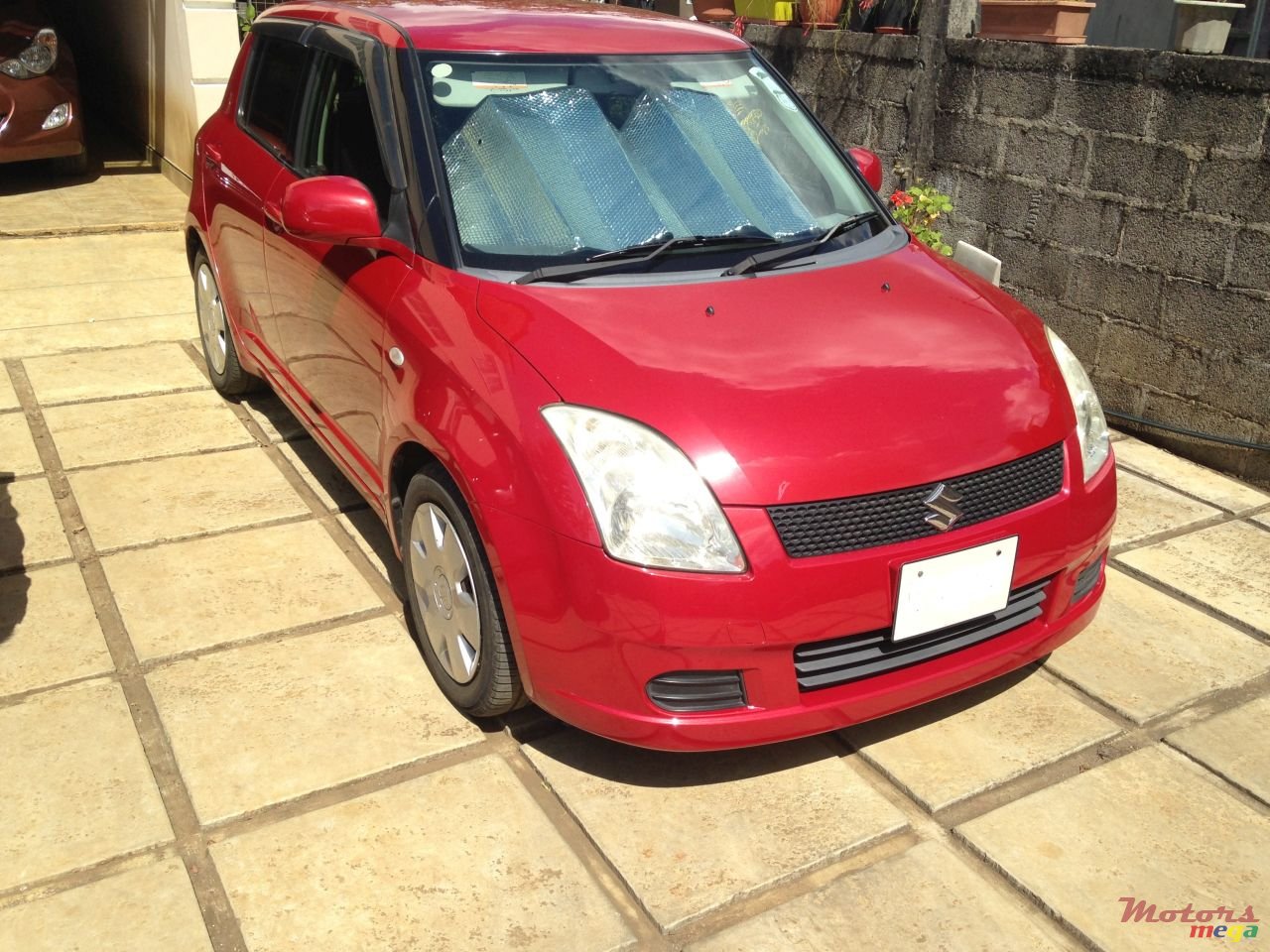 2006' Suzuki Swift photo #3