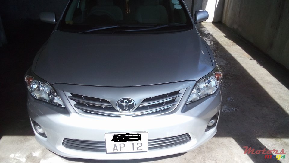 2012' Toyota Corolla G saloon photo #1