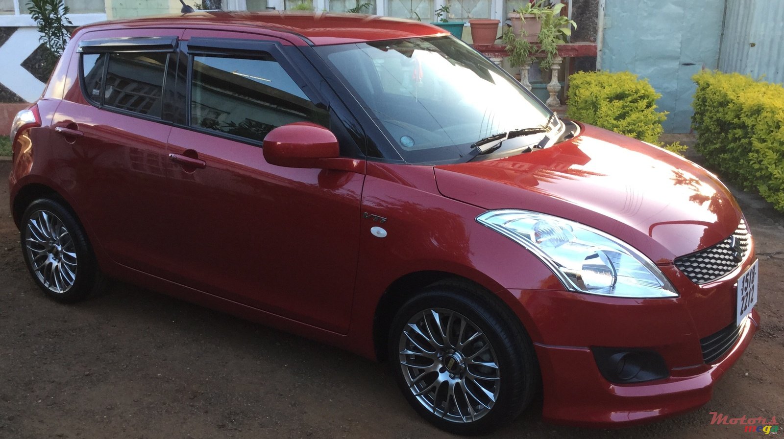 2012' Suzuki Swift photo #1
