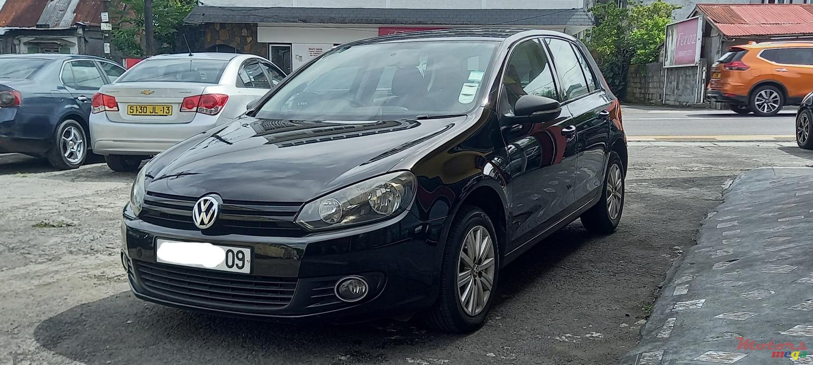 2009' Volkswagen Golf VI photo #2