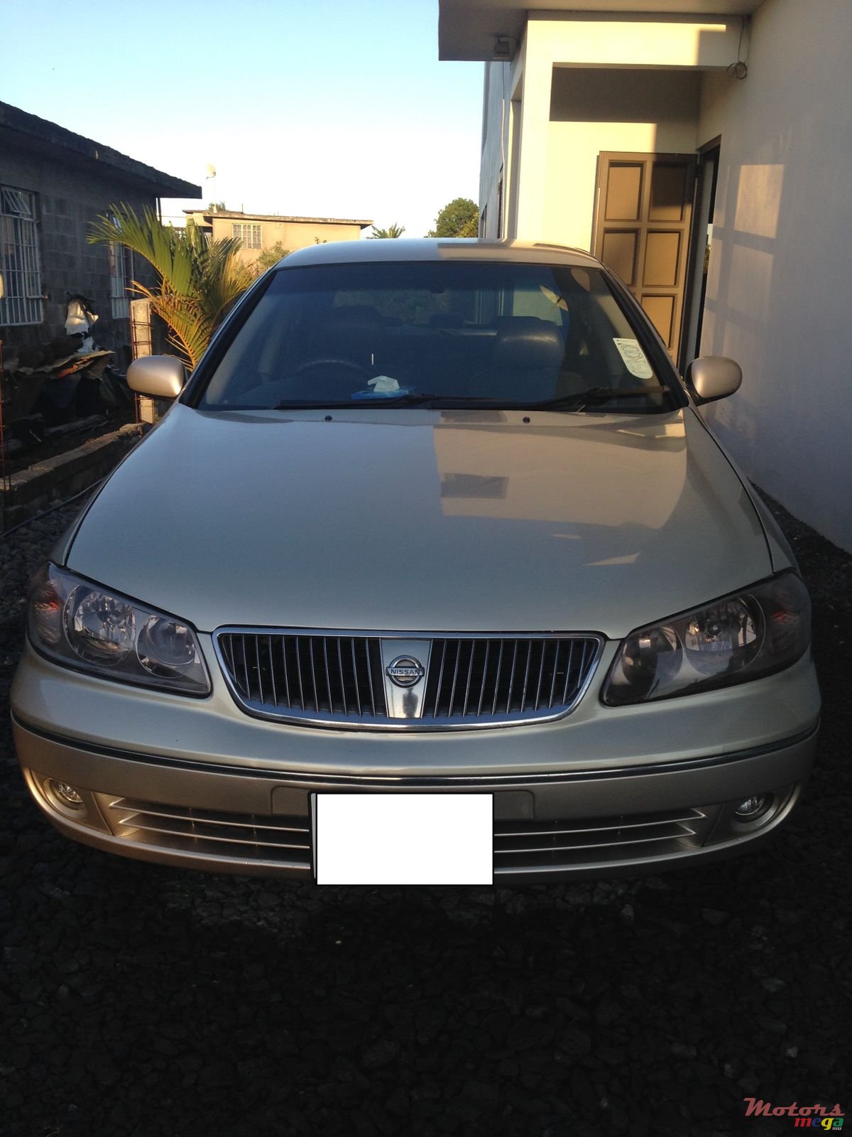 2004' Nissan Sunny photo #1