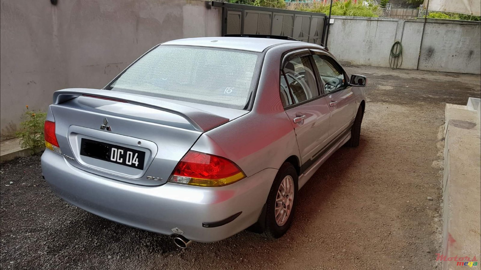 2004' Mitsubishi Lancer Glx photo #3
