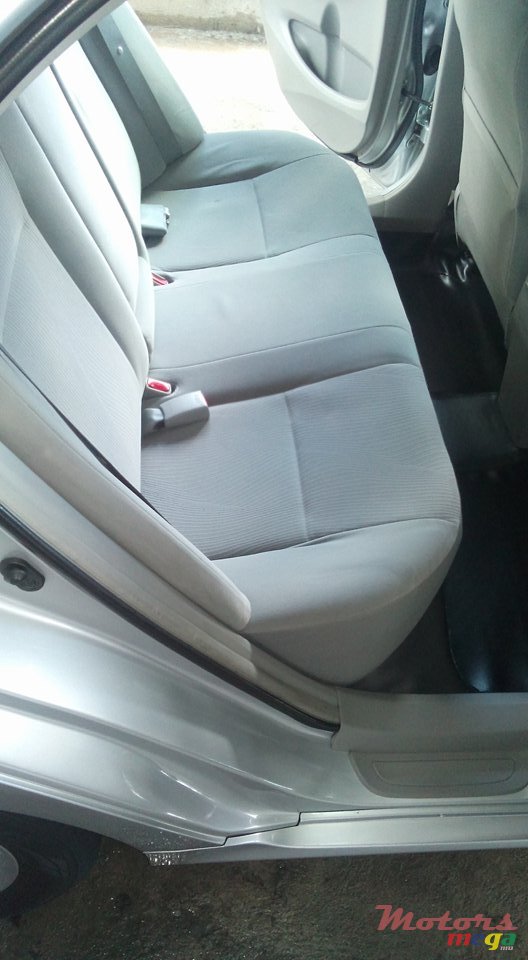 2012' Toyota Corolla G saloon photo #3