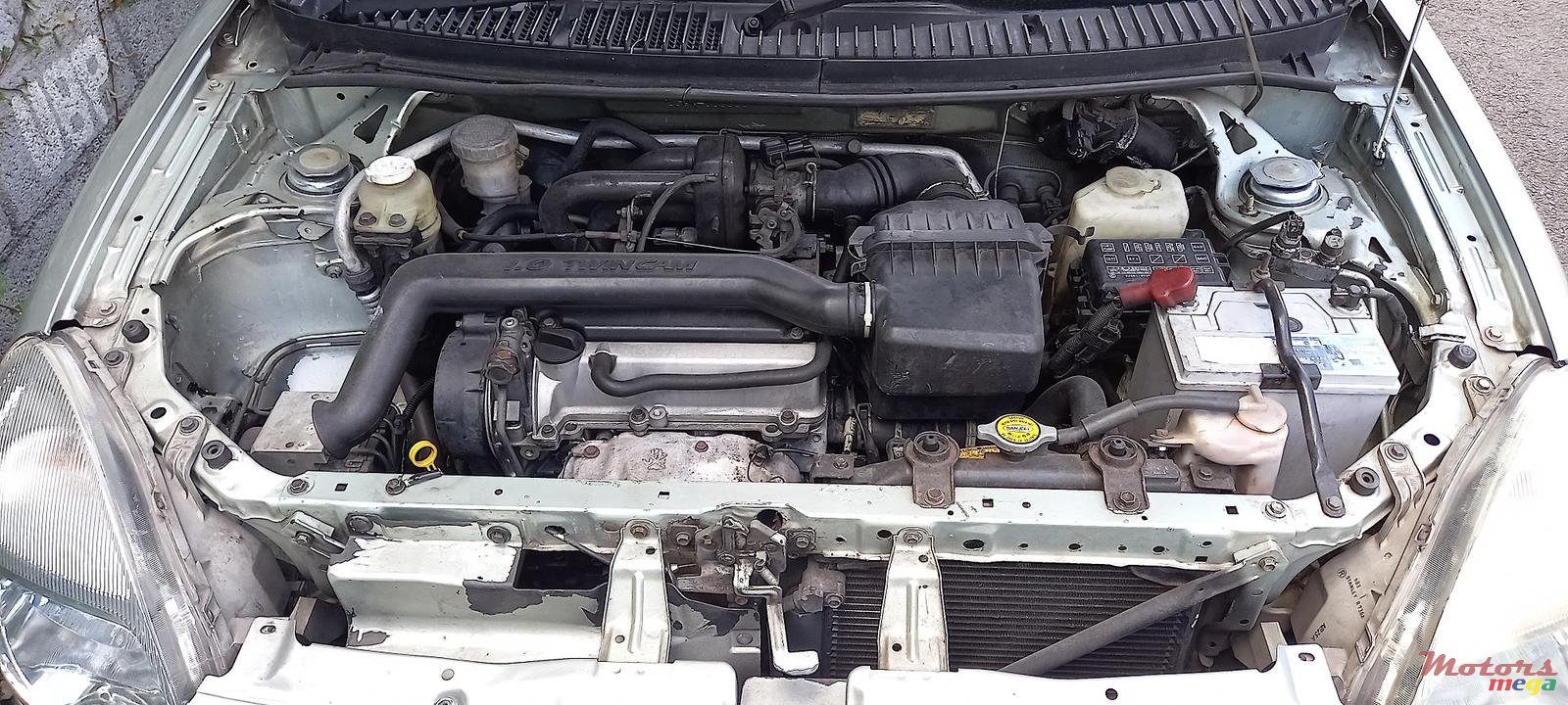 1999' Toyota Duet Hatchback photo #6