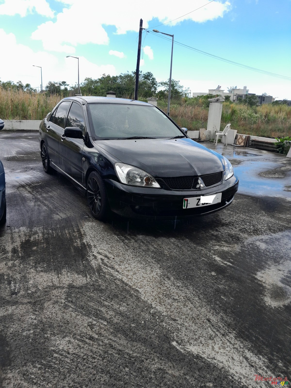 2004' Mitsubishi Lancer photo #5