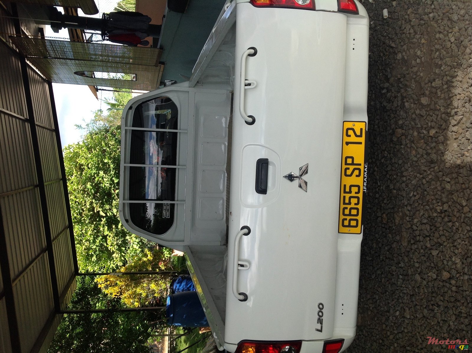 2012' Mitsubishi L 200 Single cab photo #1