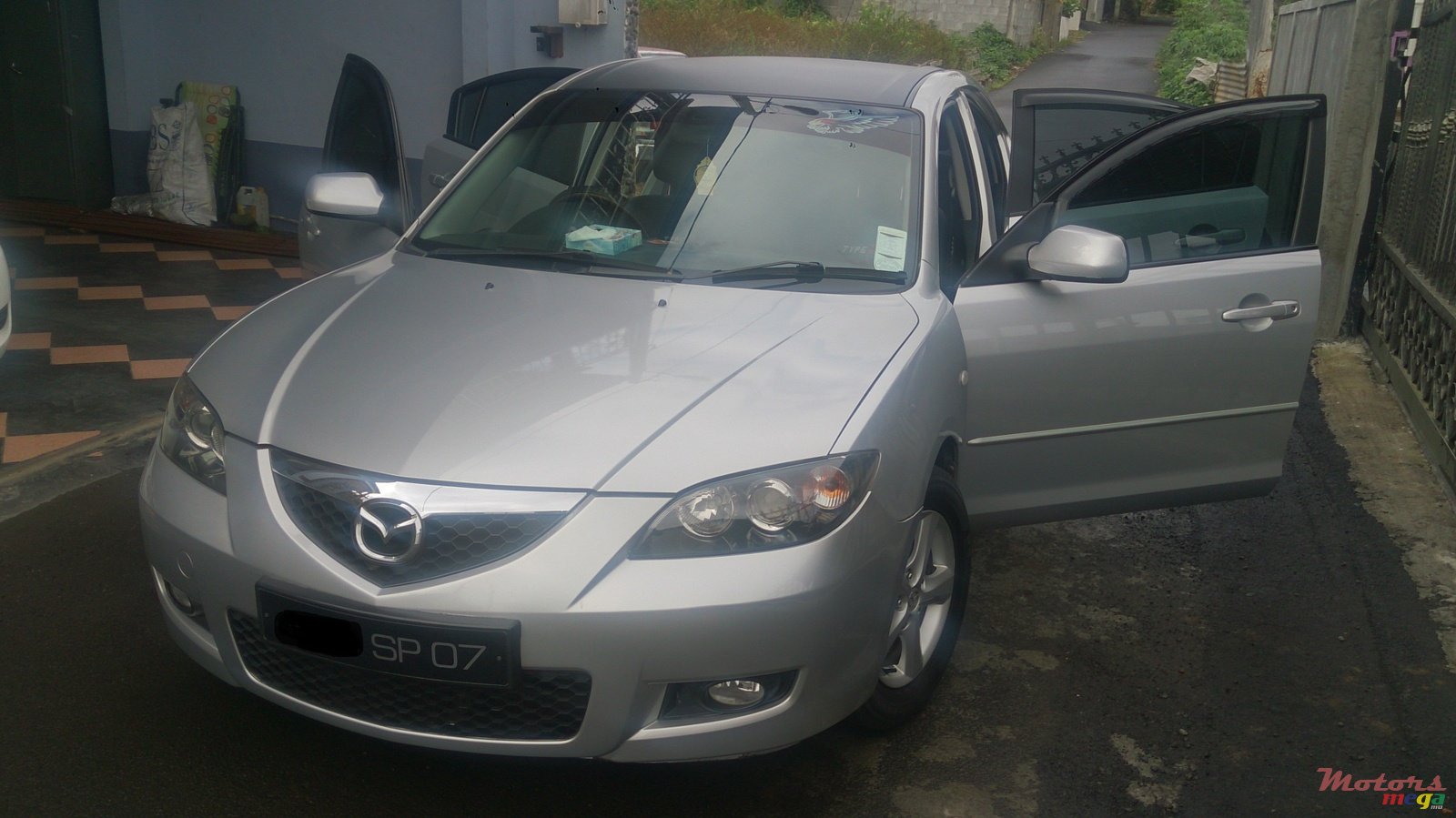 2007' Mazda 3 photo #1