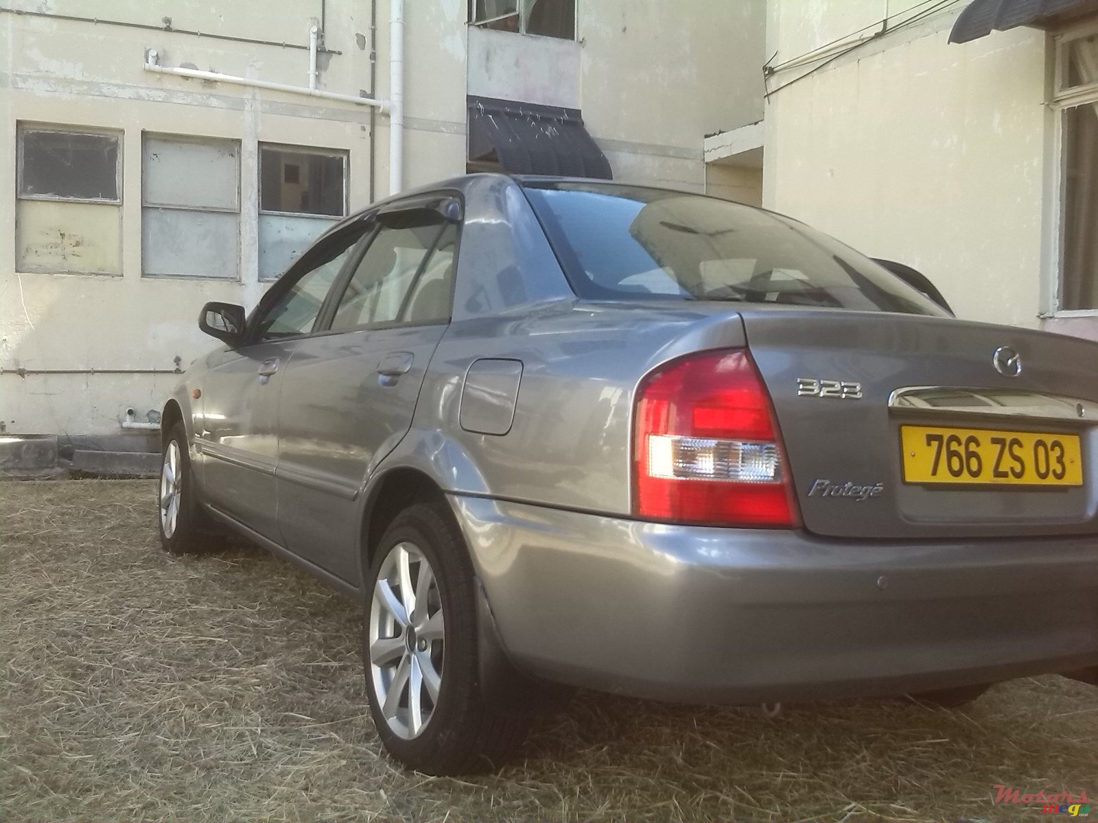 2003' Mazda 323 photo #1