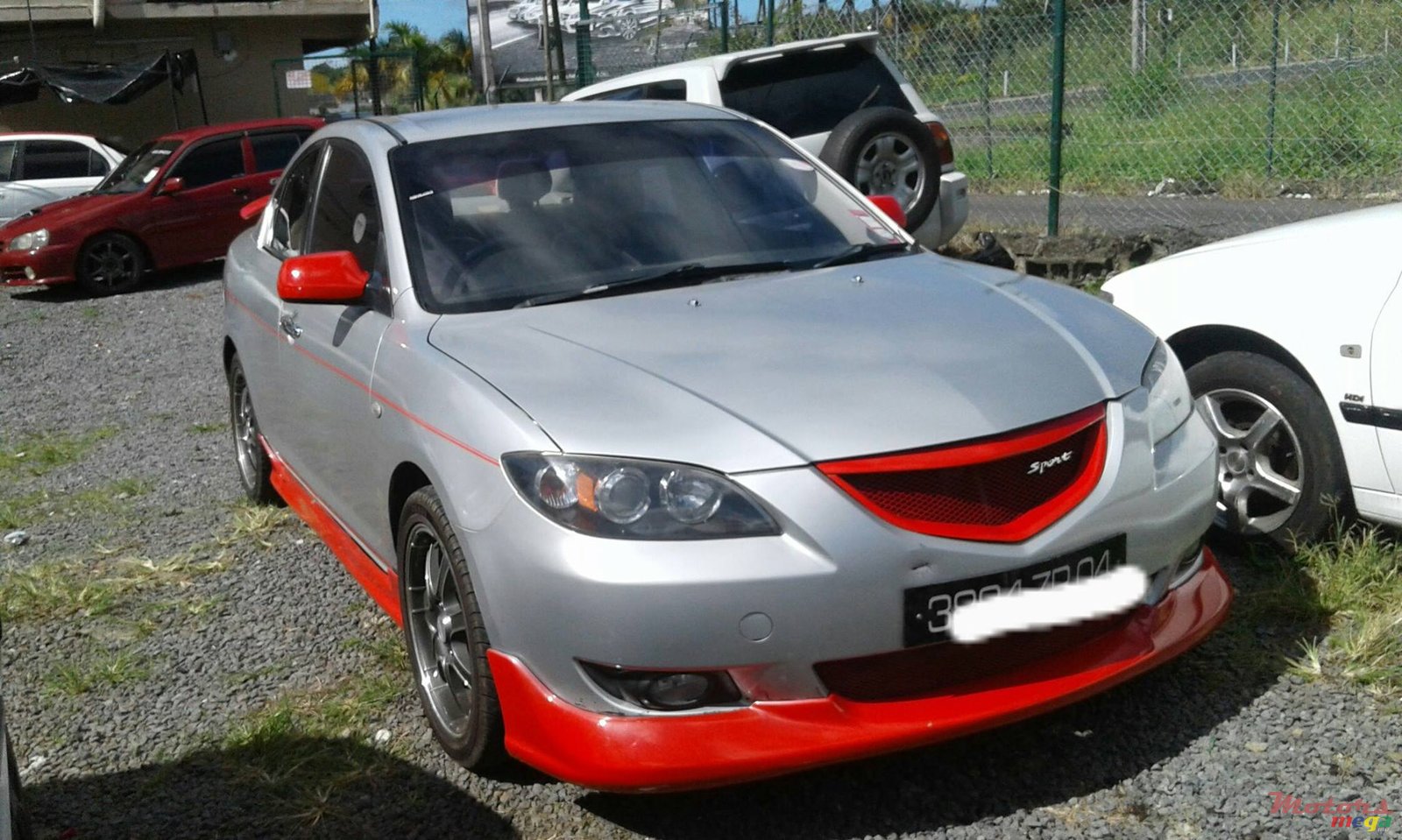 2004' Mazda 3 photo #1