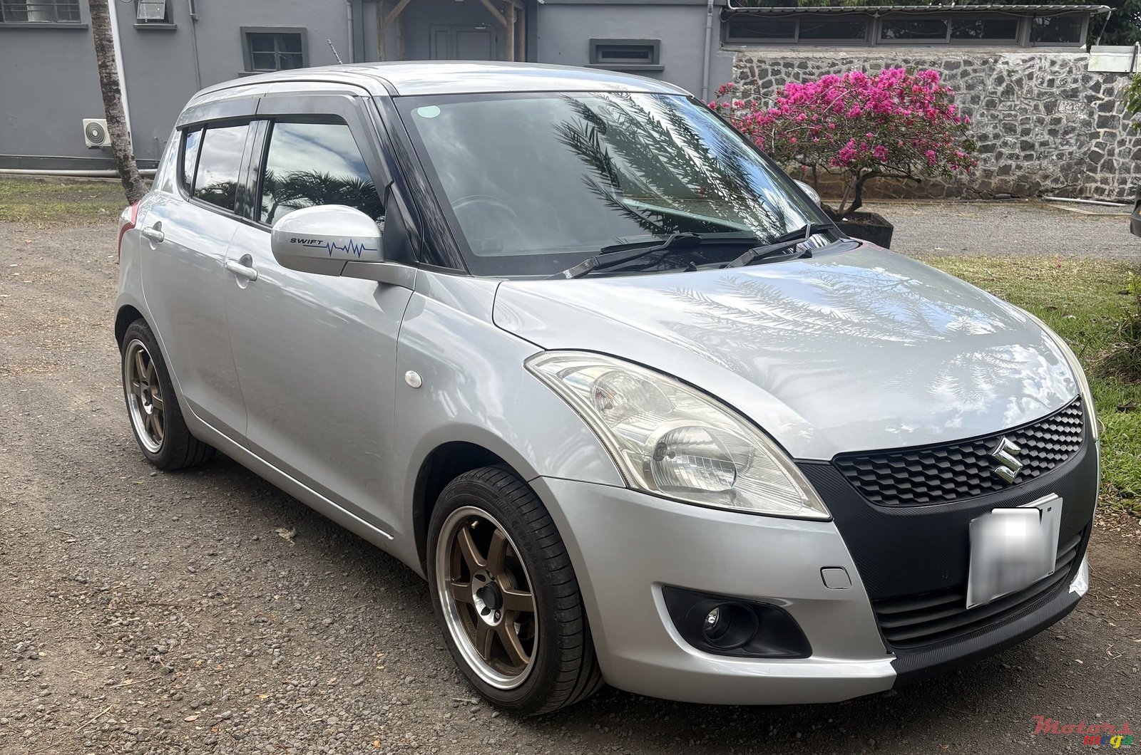 2012' Suzuki Swift photo #1