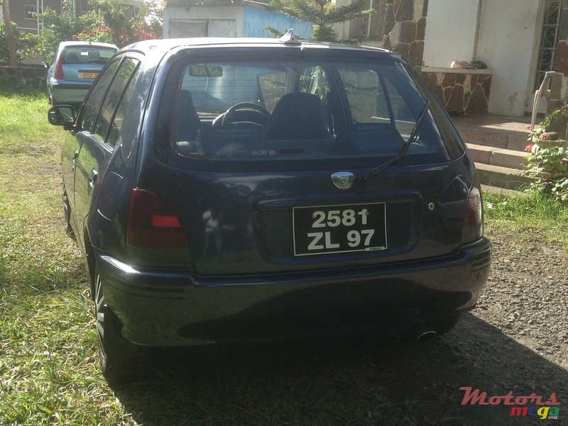 2004' Toyota Starlet photo #3