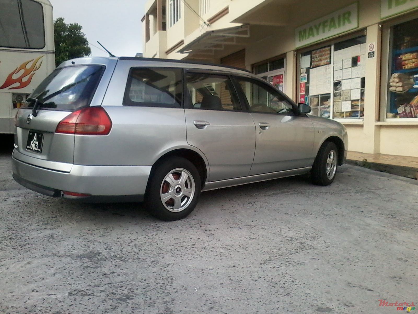 2004' Nissan Wingroad photo #2