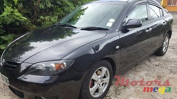 2005' Mazda 3 sedan photo #1