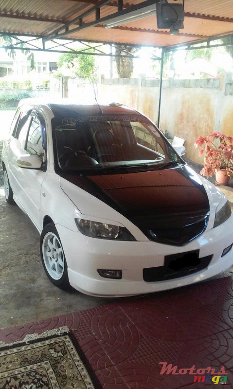 2004' Mazda Demio photo #1