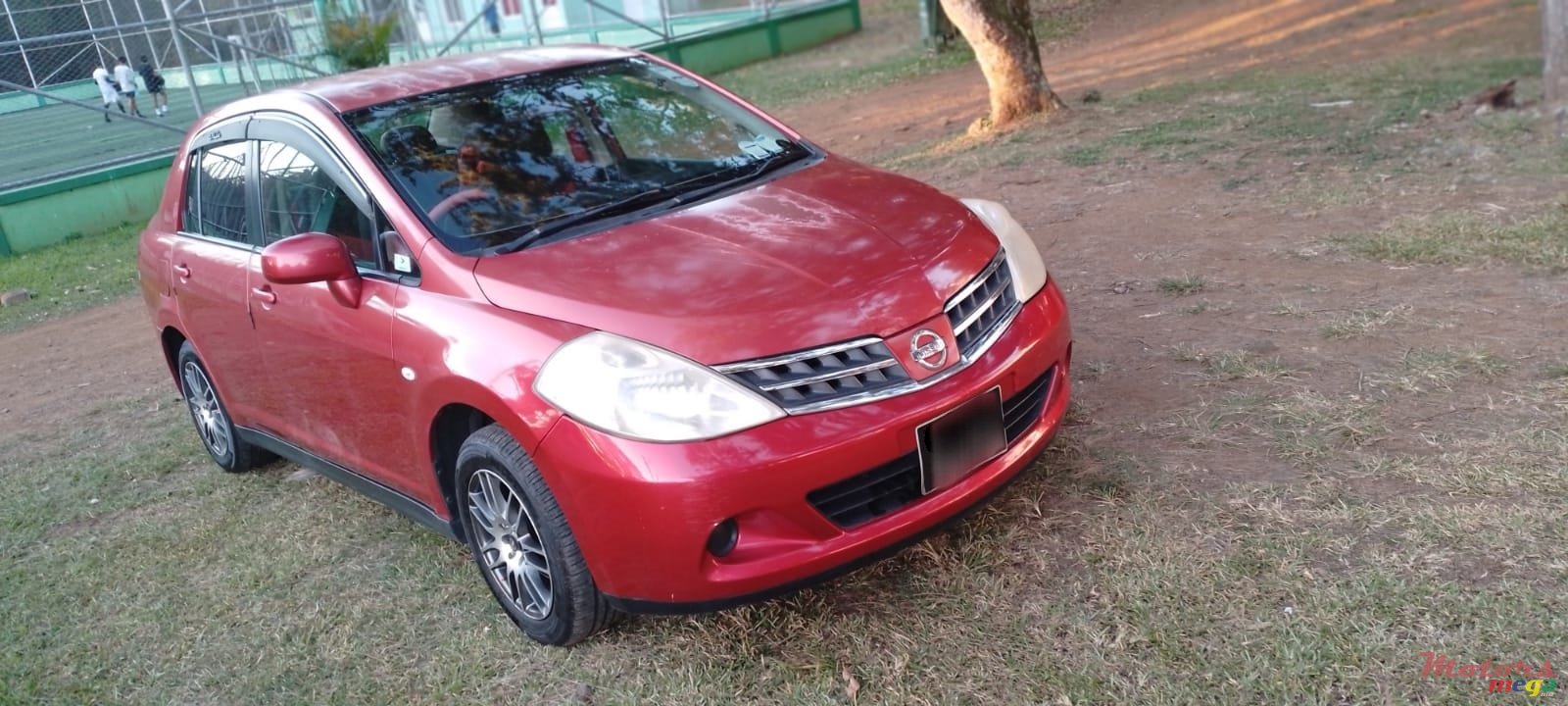 2010' Nissan Tiida photo #1