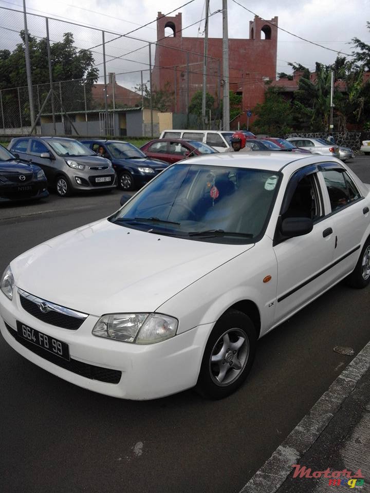 1999' Mazda 323 photo #1