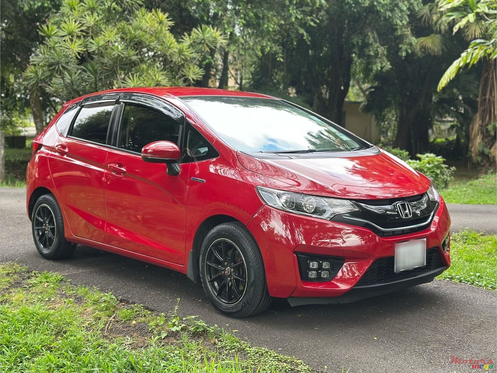 2014' Honda Fit hybrid photo #1