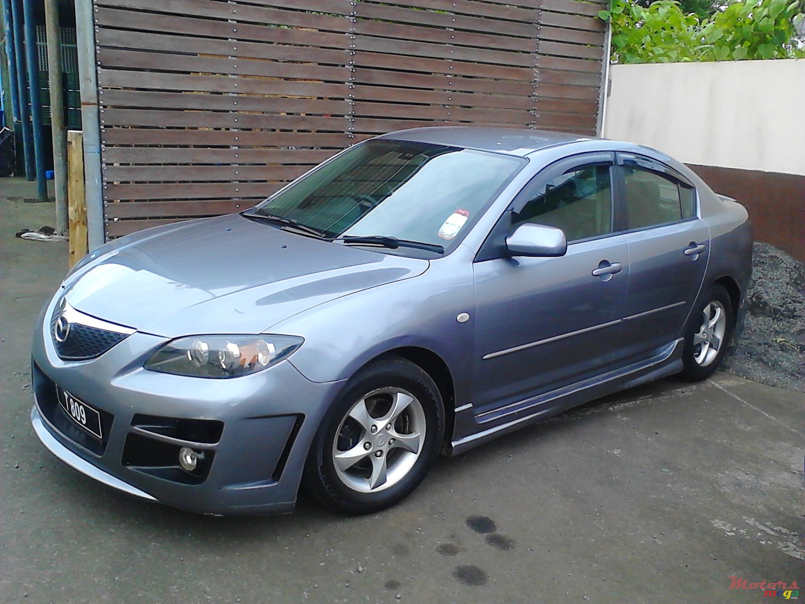 2004' Mazda 3 photo #1