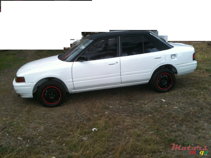 1990' Mazda 323 photo #2