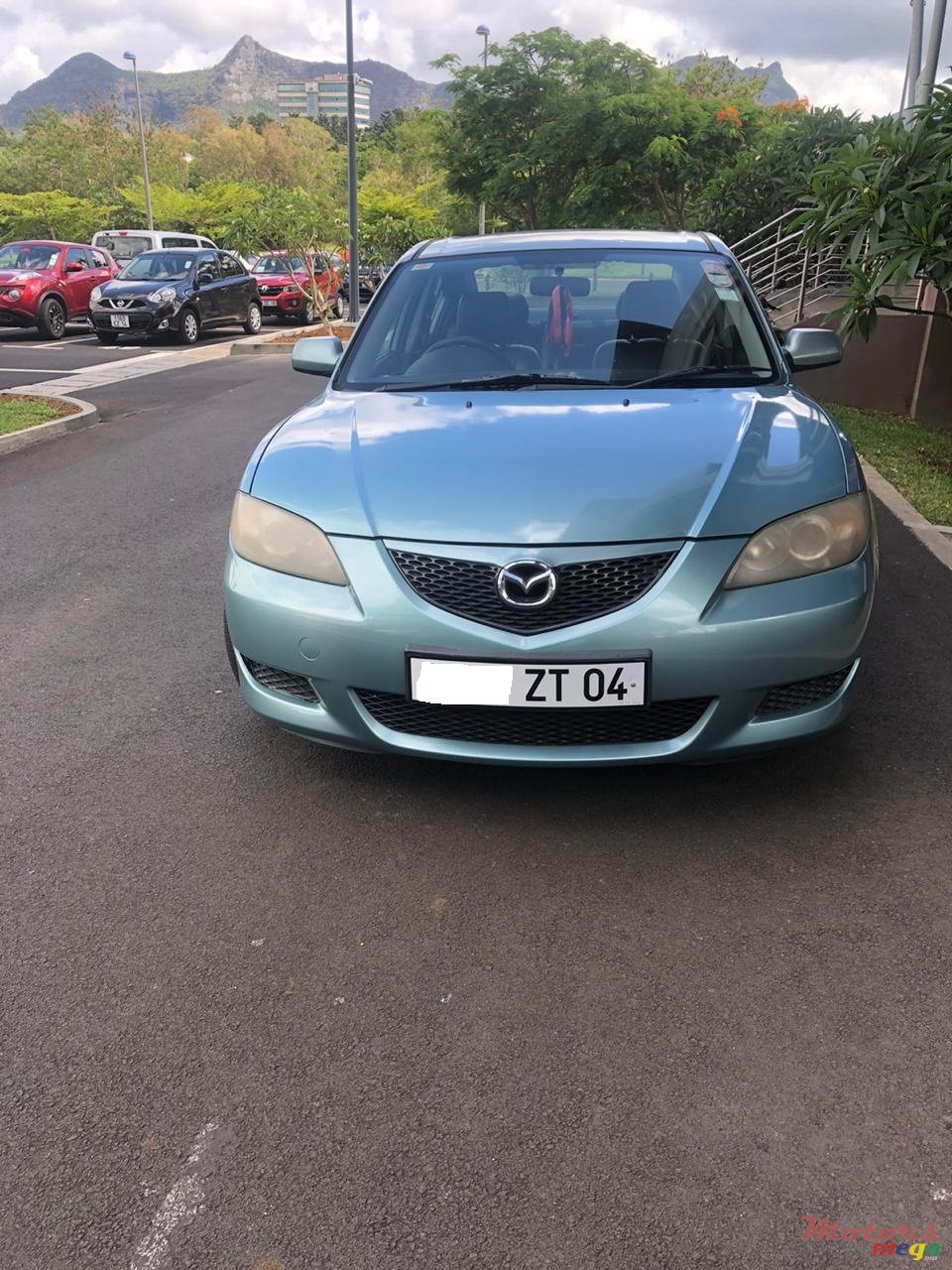 2004' Mazda 3 photo #1