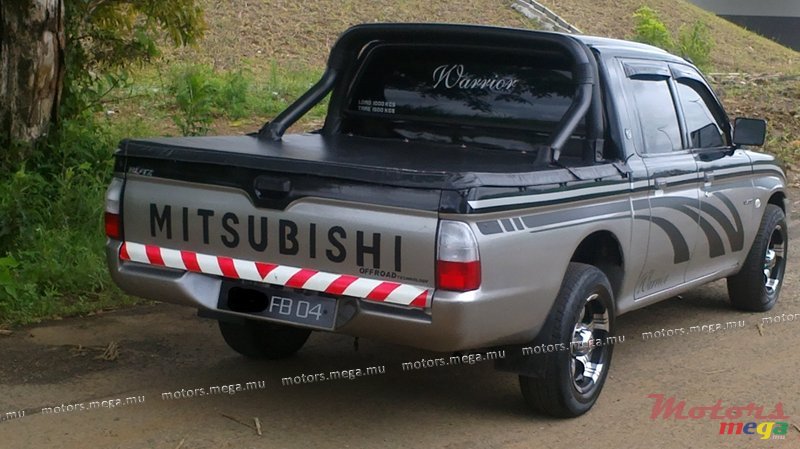 2004' Mitsubishi Warrior L200 photo #4
