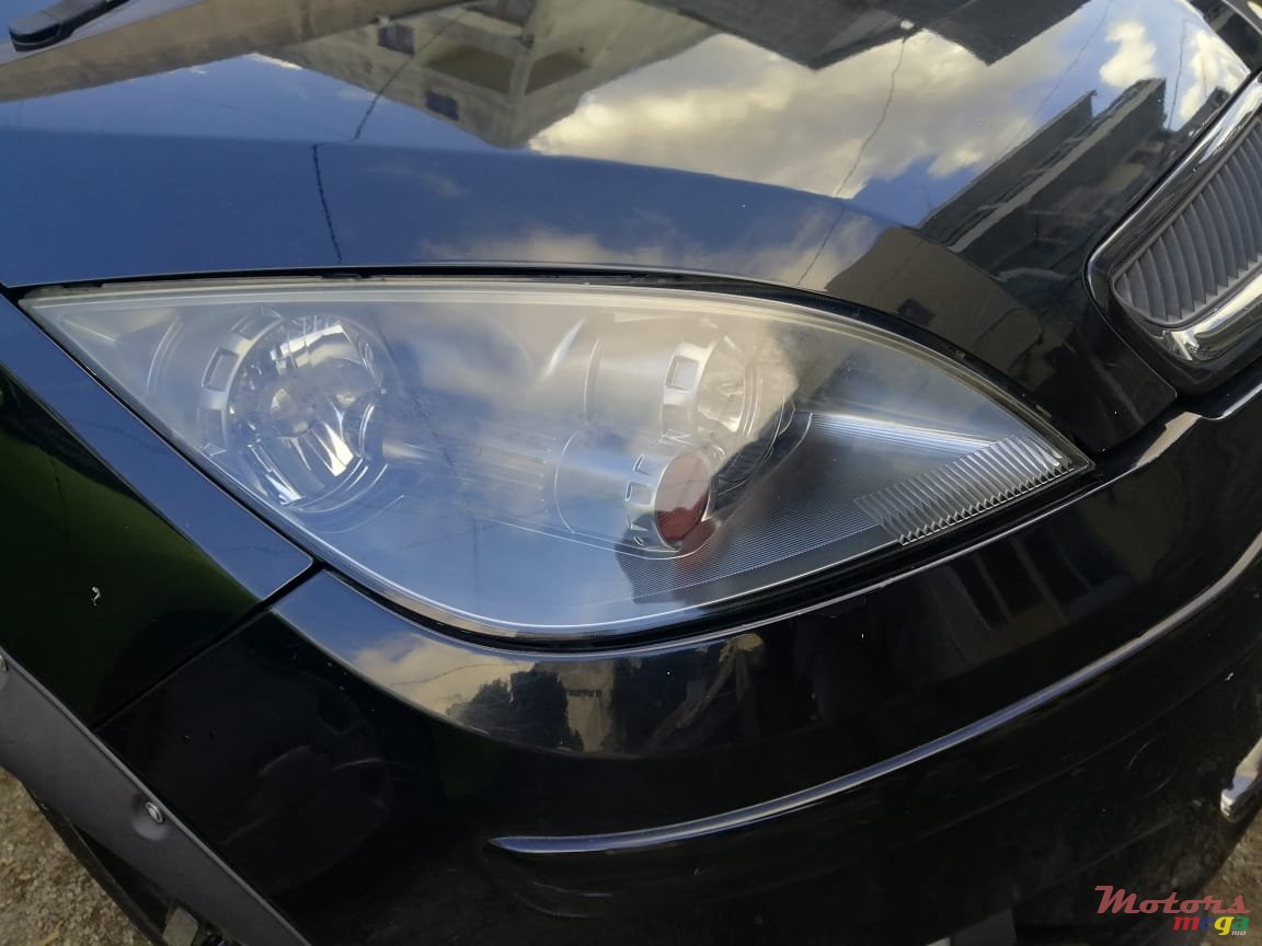 2004' Mitsubishi Colt photo #2