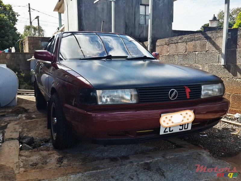 1990' Nissan Sunny echappement sport, alloy wheel photo #1