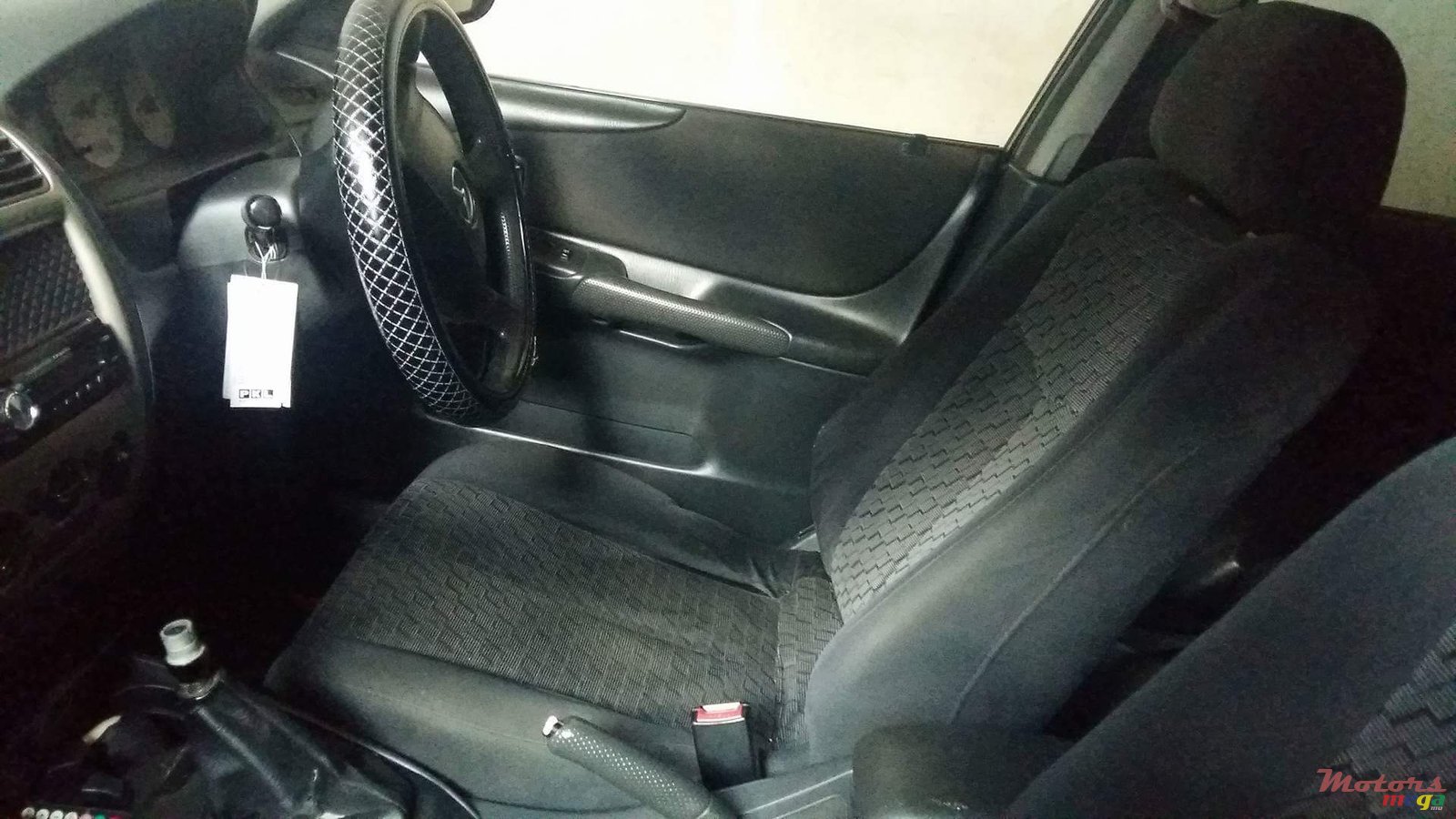 2001' Mazda 323 Hatch Back photo #5