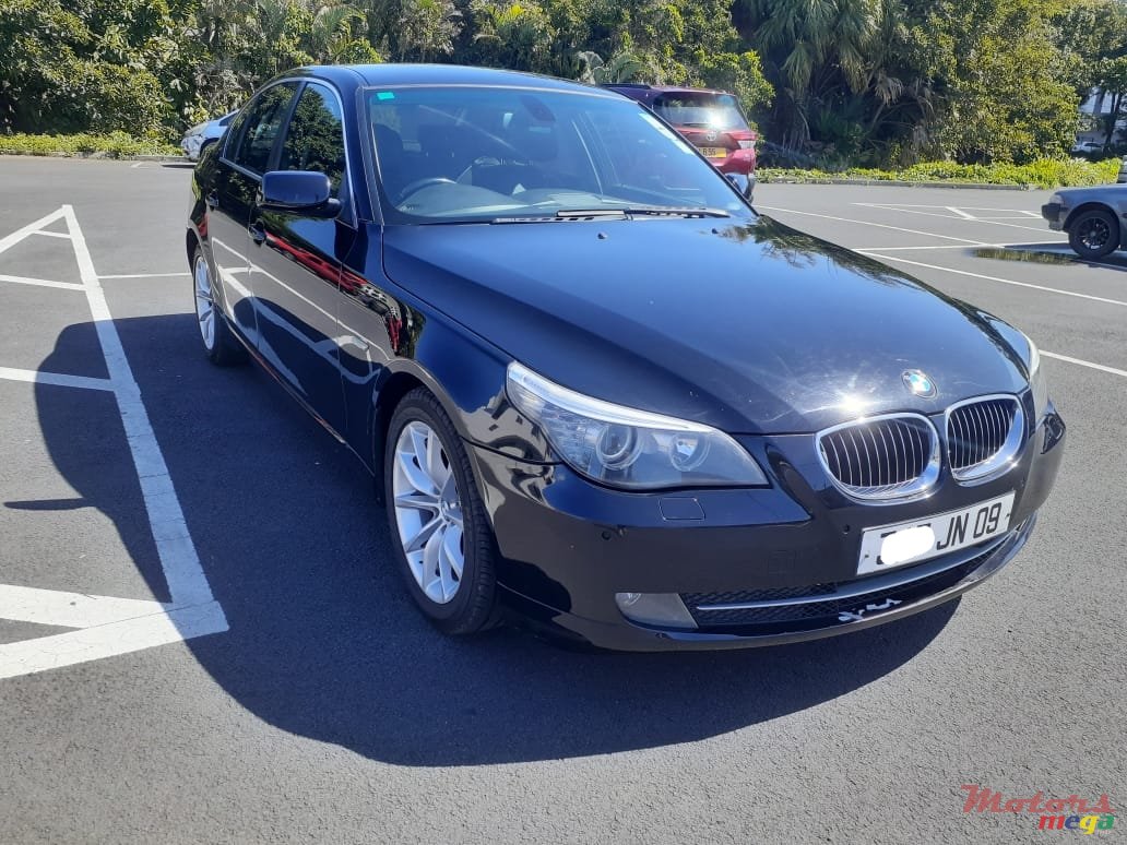 2009' BMW 520 photo #1