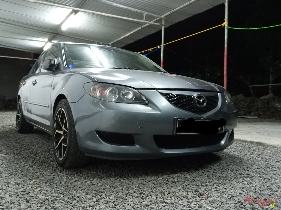 2004' Mazda 3 photo #1