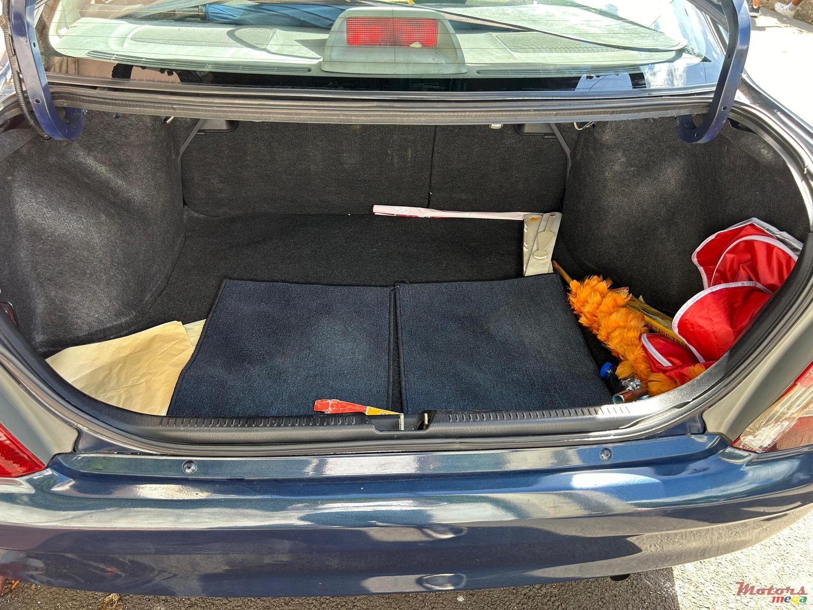 2000' Mazda 323 photo #7