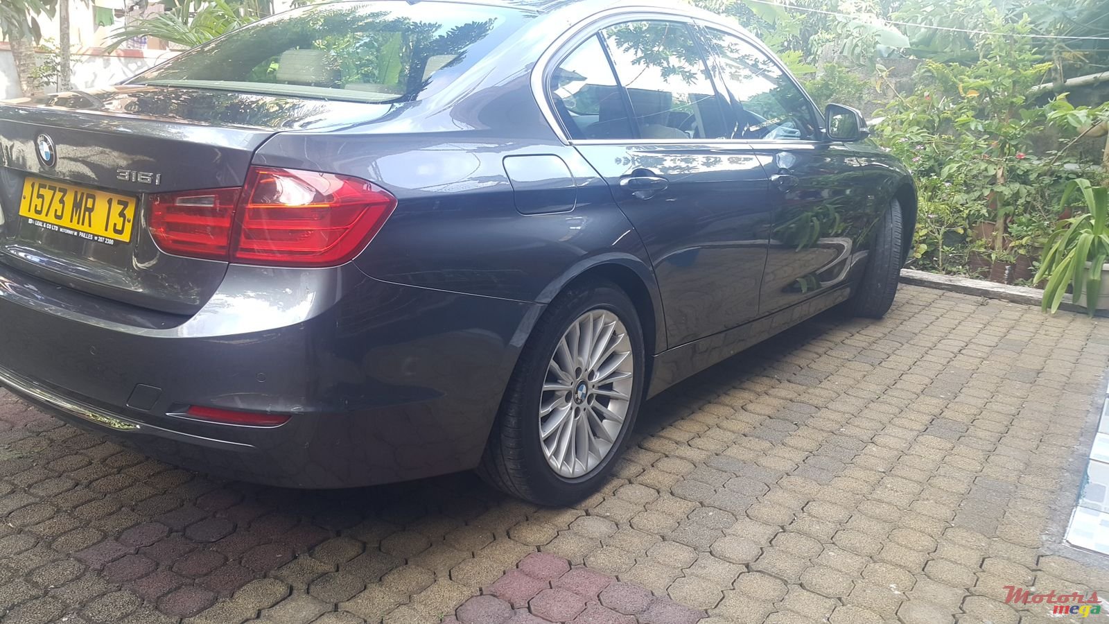 2013' BMW 316 photo #2