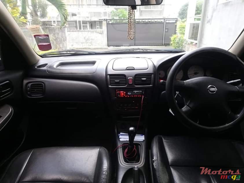 2004' Nissan Sunny photo #1