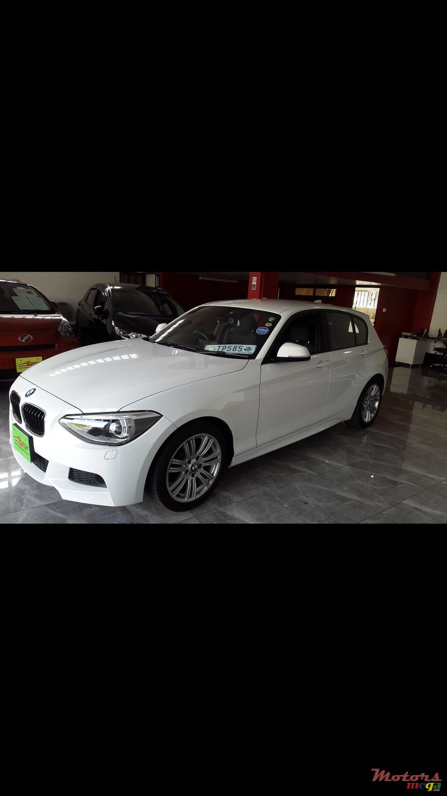 2014' BMW 1 Series 5 Door M sport photo #1