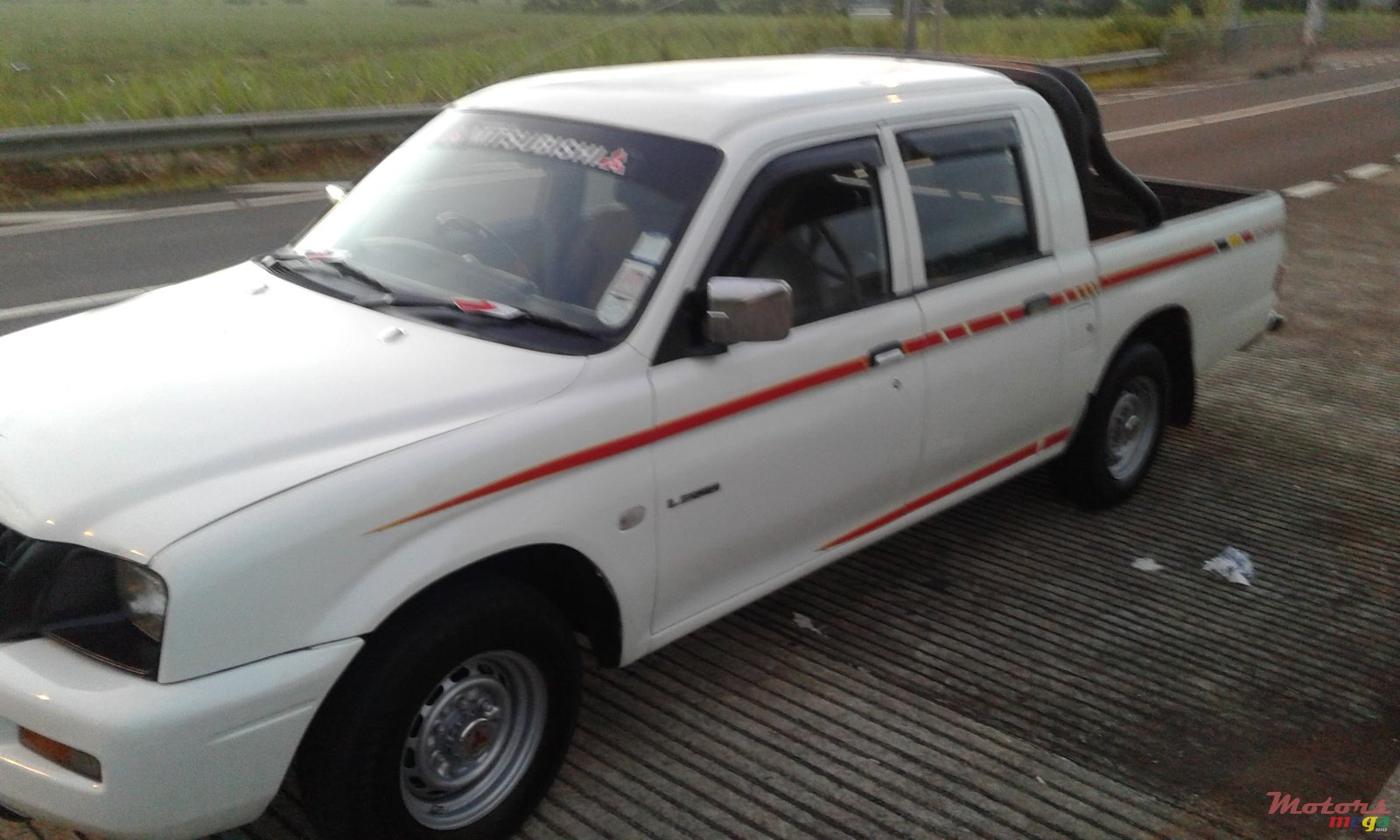 2002' Mitsubishi L 200 photo #1