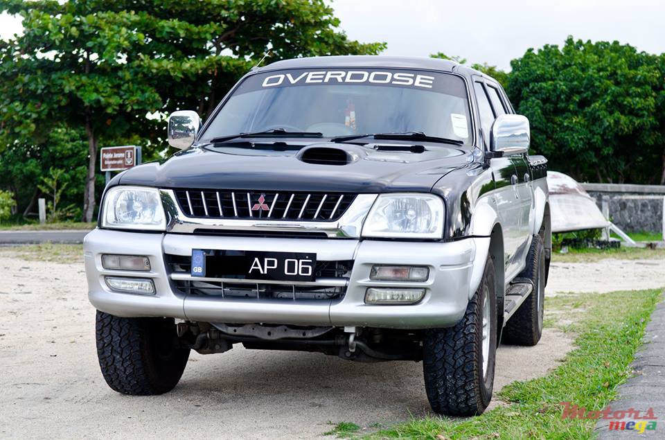 2006' Mitsubishi L 200 4x4 xtreme limited edition photo #1