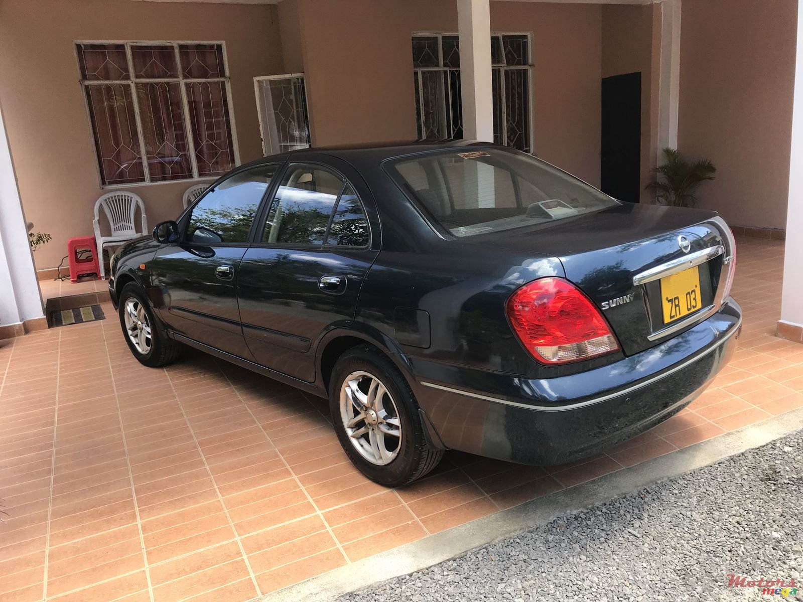 2003' Nissan Sunny photo #1