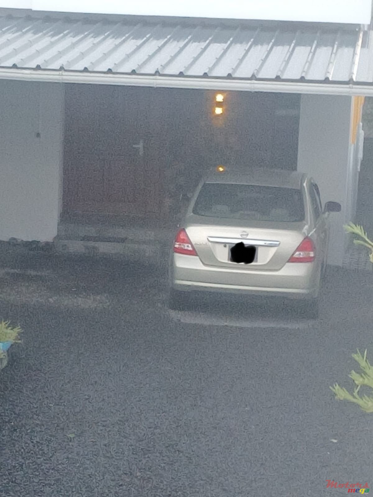 2005' Nissan Tiida photo #1