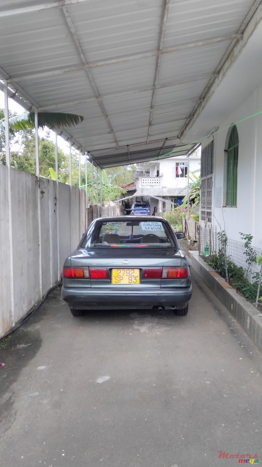 1993' Nissan Sunny saloon photo #1