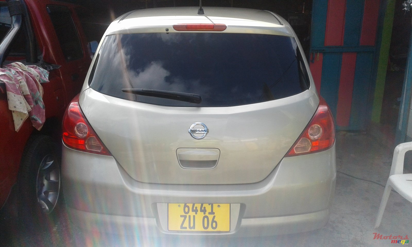 2006' Nissan Tiida hatchback photo #1