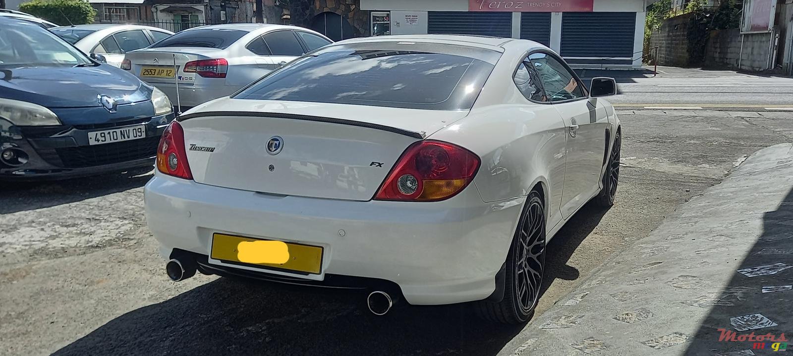 2004' Hyundai Tuscani photo #4