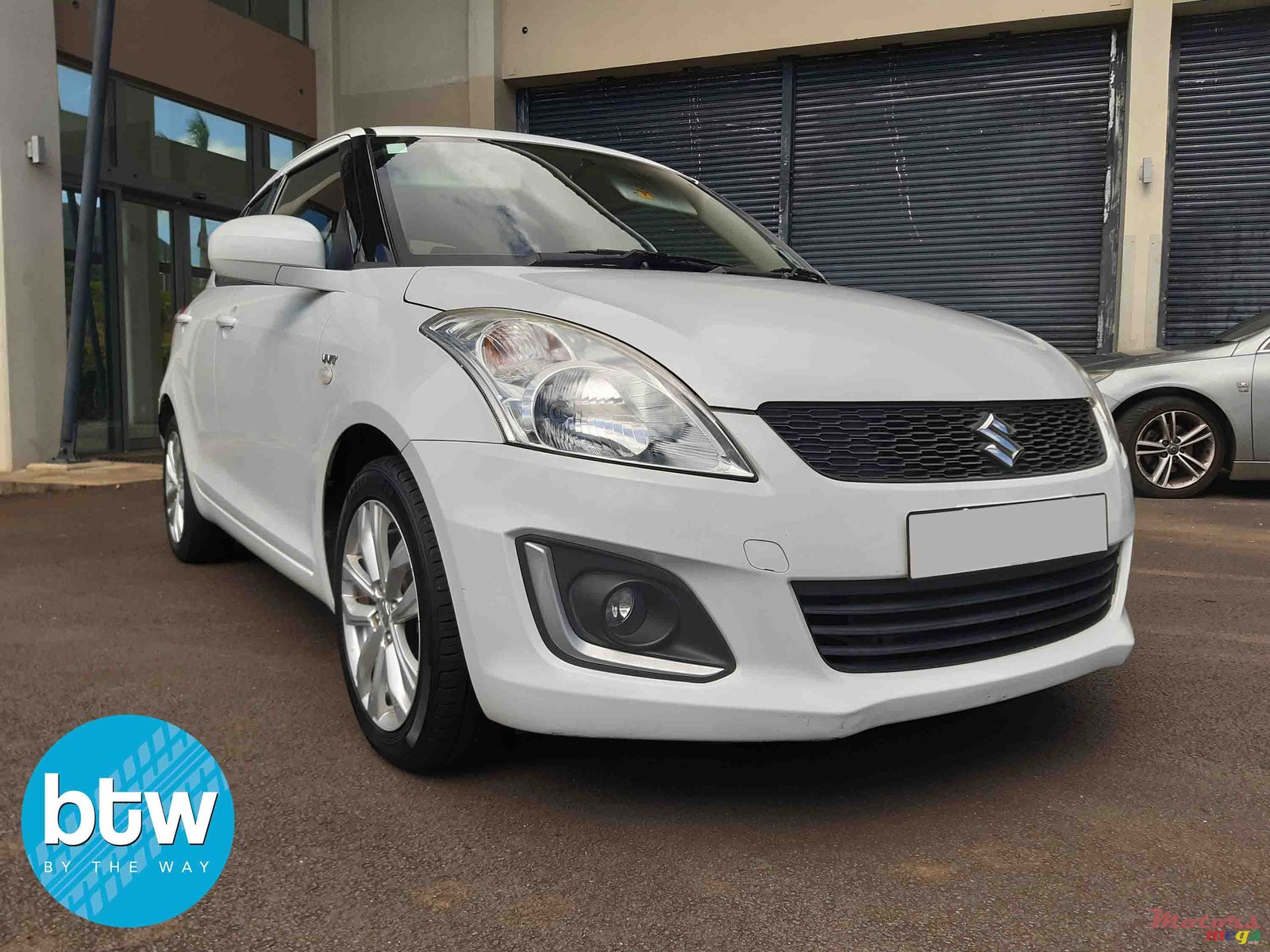2014' Suzuki Swift photo #1