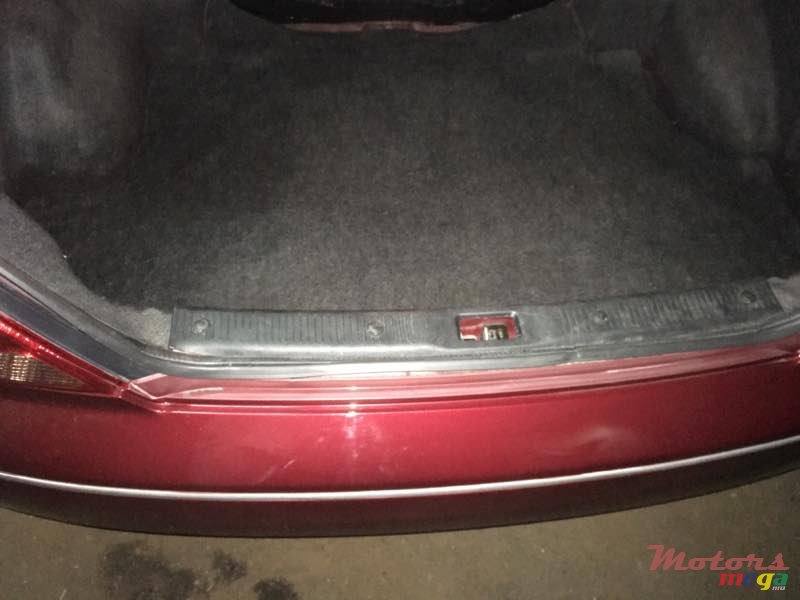 2004' Nissan Sunny photo #2