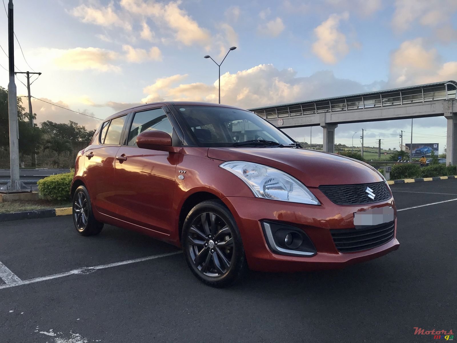 2015' Suzuki Swift photo #1