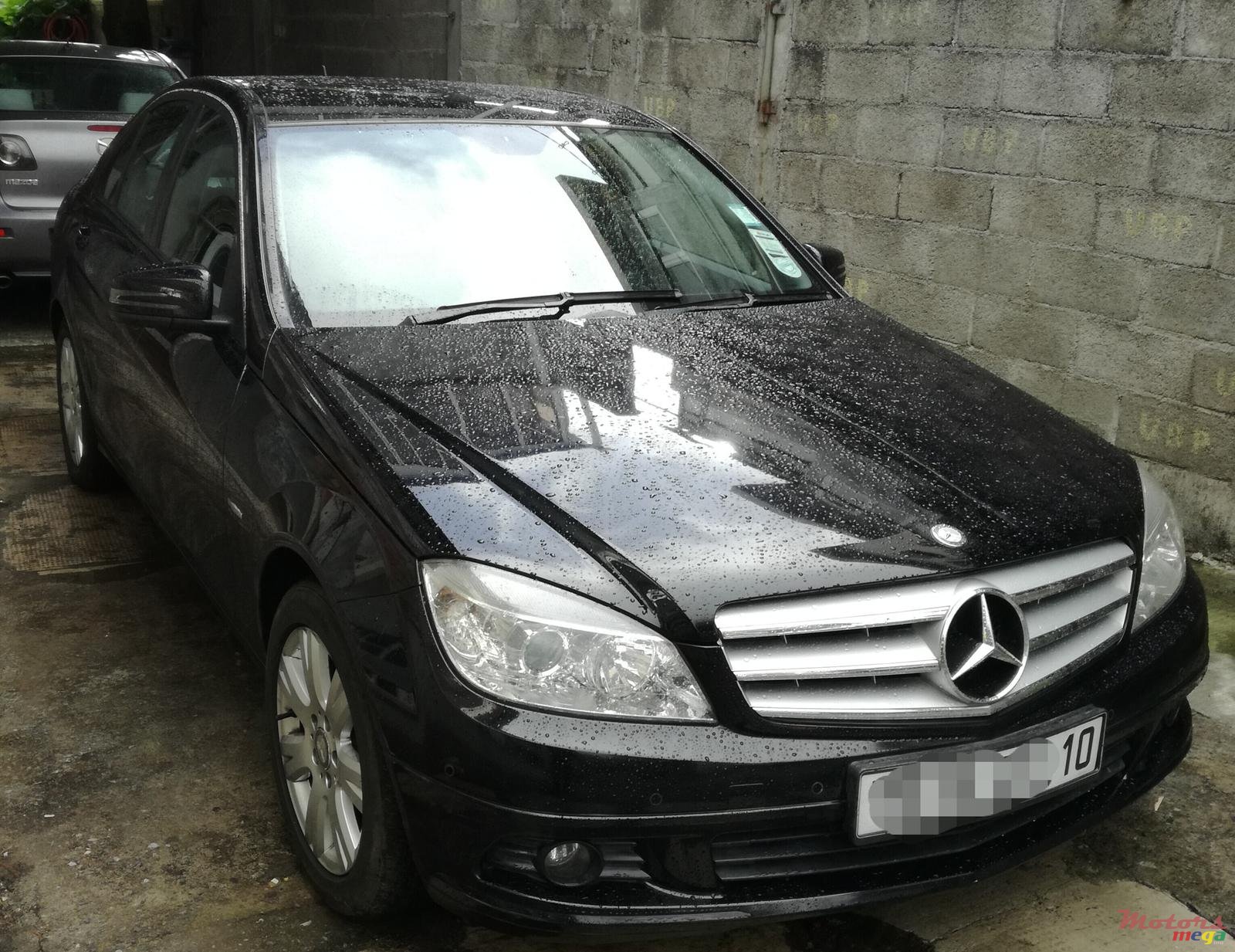 2010' Mercedes-Benz C-Class C180 blue efficiency photo #1