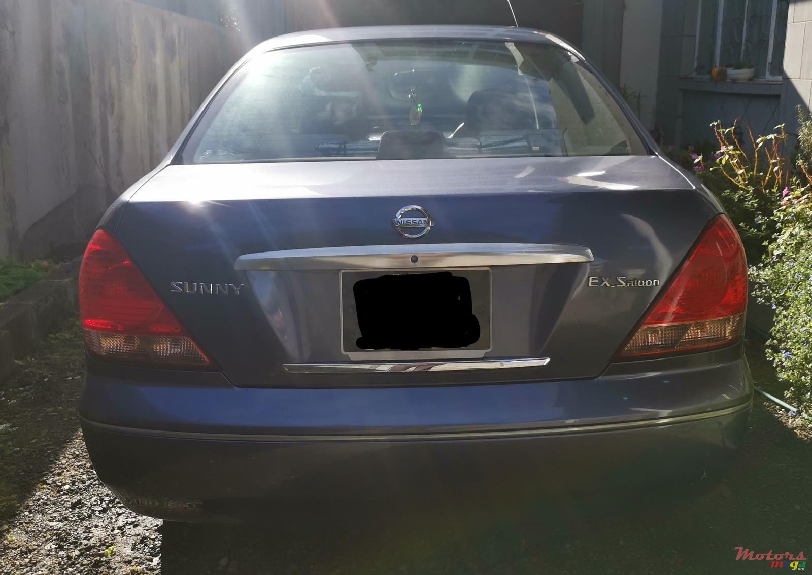 2004' Nissan Sunny photo #1